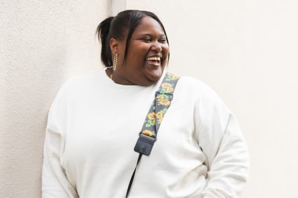 Woman smiling confidently β the positive outcome of psychiatric care at Minnesota Mental Health Clinics