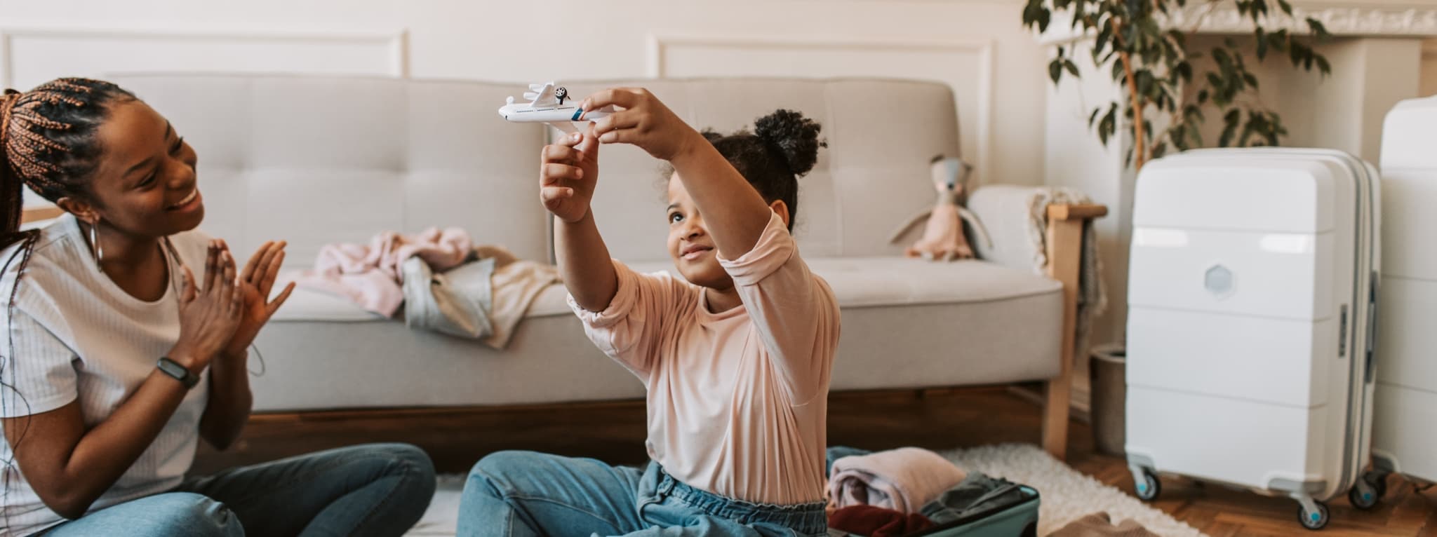 Child playing joyfully with a toy airplane β the confidence and freedom that comes after an ADHD assessment at MMHC