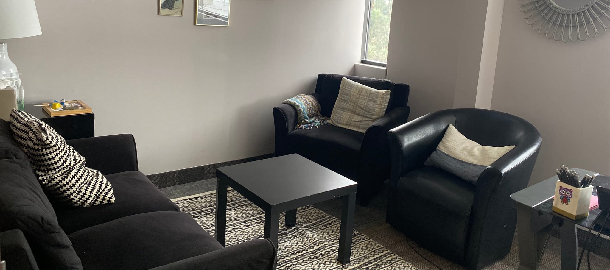 Comfortable therapy office at Minnesota Mental Health Clinics with cozy seating and a welcoming atmosphere